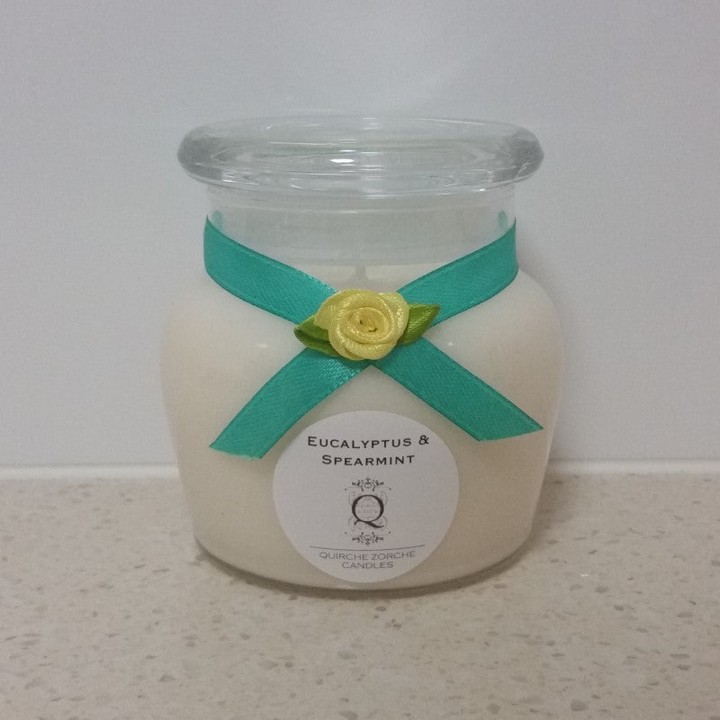 quirche zorche candles, scented candle, fragrant candle, wick, candle, glass jar candle, glass jar, one wick candle, candle fragrance, home fragrance, fragrance, décor, frangipani, white candle, white, natural, eucalyptus and spearmint candle, eucalyptus and spearmint fragrance